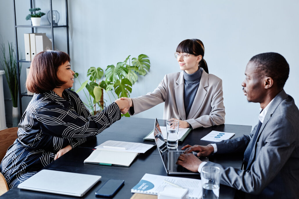 Business People Greeting in Meeting